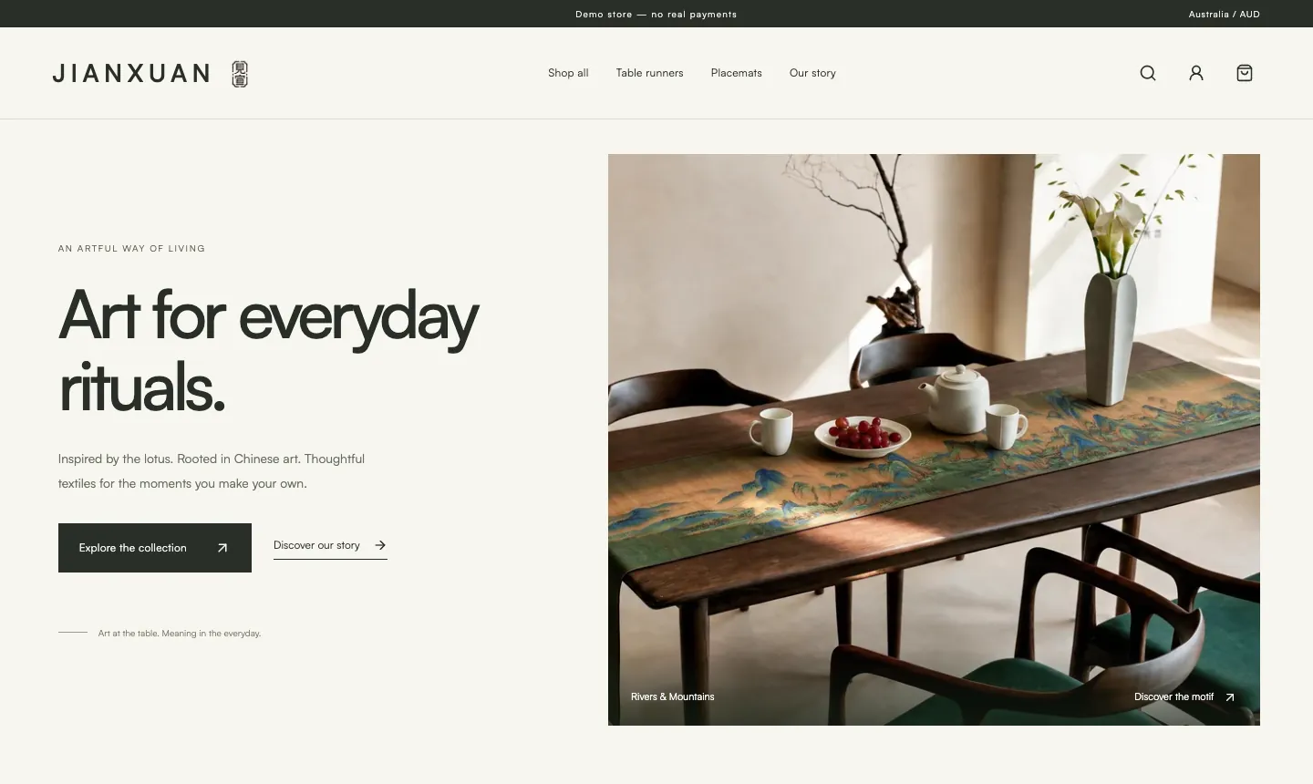 见宣 JIANXUAN 独立站首页:Art for everyday rituals 标题与山水纹桌旗场景图